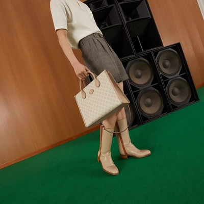 Piccola borsa a tracolla suprema Tote With Interlocking G della tela di Gucci