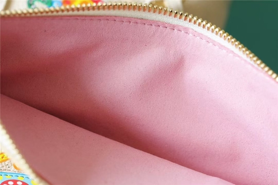 Il partito ha marcato a caldo le signore monogramma Empreinte di Neverfull millimetro della borsa con l'intarsiatura del fiore